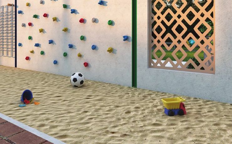 Sand pit with wall climbers for children